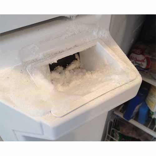 how to clean ice dispenser chute on whirlpool refrigerator